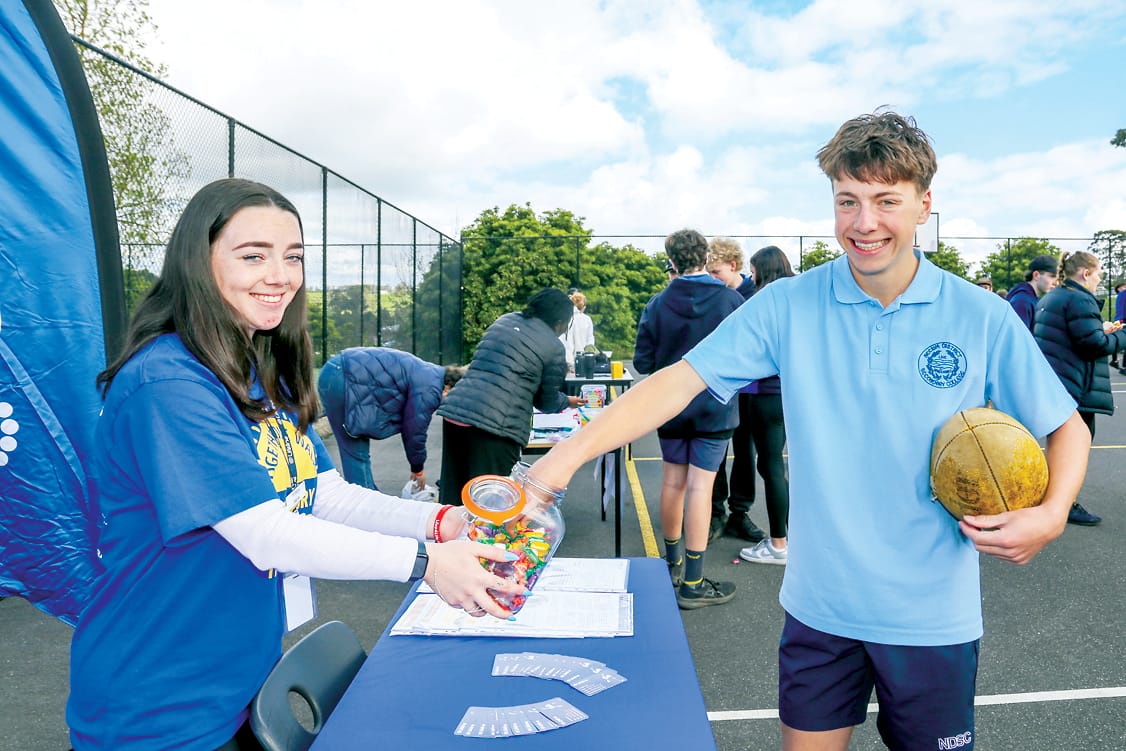 Lifeline's Sophie Tripodi and Dean Seadden claiming his candy.