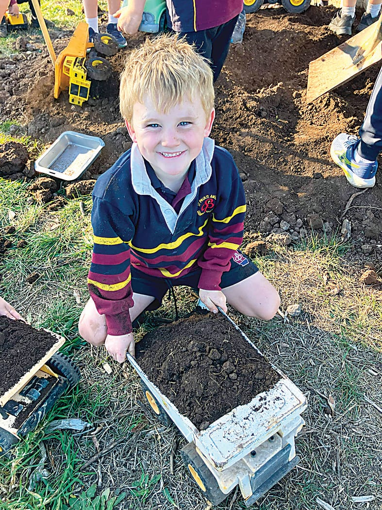 William Elliott learns a creative way to cart some dirt for the new Kitchen Garden.