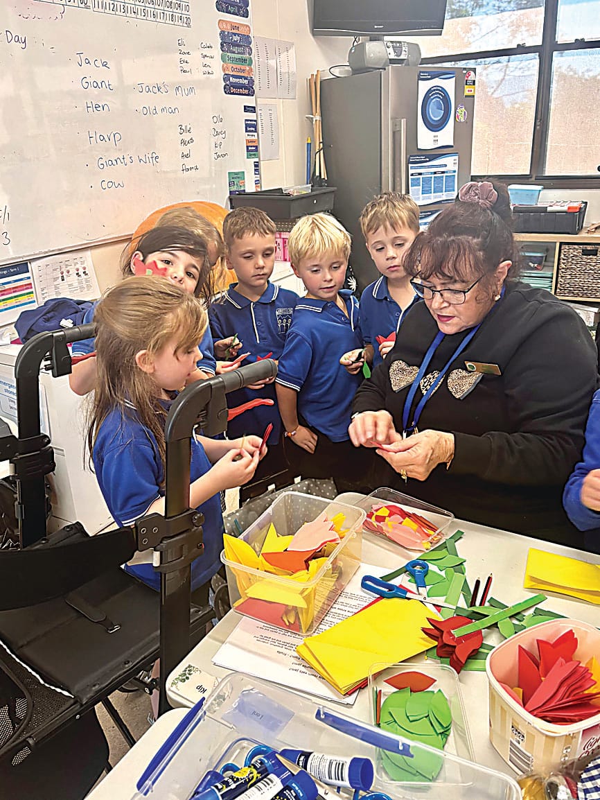 Prep and year one students Bonnie, Amelia, Dustin, Brock, Rafe working on their Mother's Day gifts with Judith Davies.