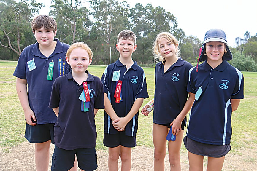 Bona Vista's Fenix Rosse, Lucas Pope, Alex Jagoe, Chane Hayes and Izzy Williams enjoy a break between events.