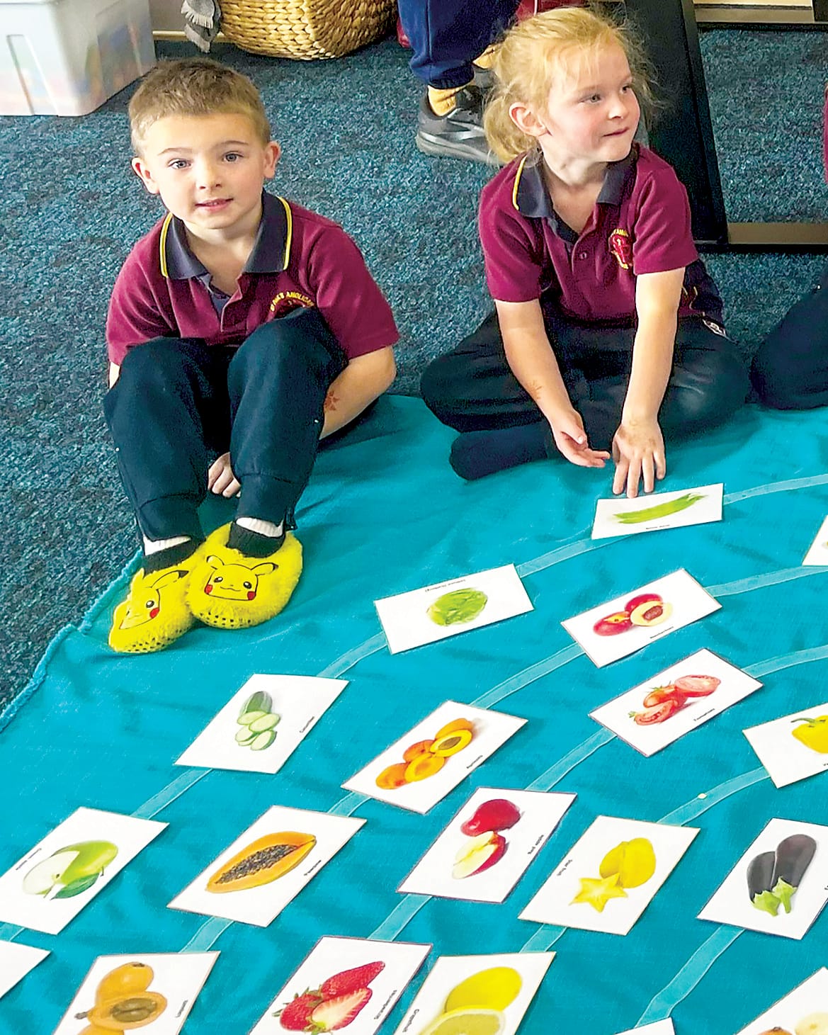 Cruze Phelan and Navy May learning about healthy food options from WGHG health promoters.