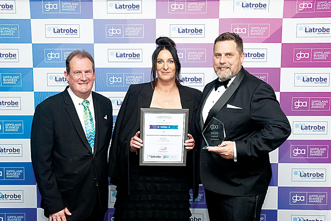 Winning the best new business award are Helen Lester and Matt Russell from Uncommon Solar and Battery Storage in Drouin who received the award from Dale Harriman of Latrobe City Council (left).