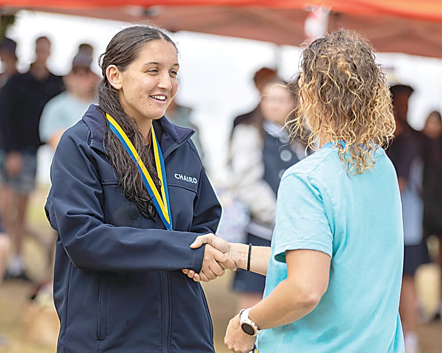 Chairo school captain Bexie Clements receiving her girls under 21 champion medal from teacher Jacinta Ballantyne.