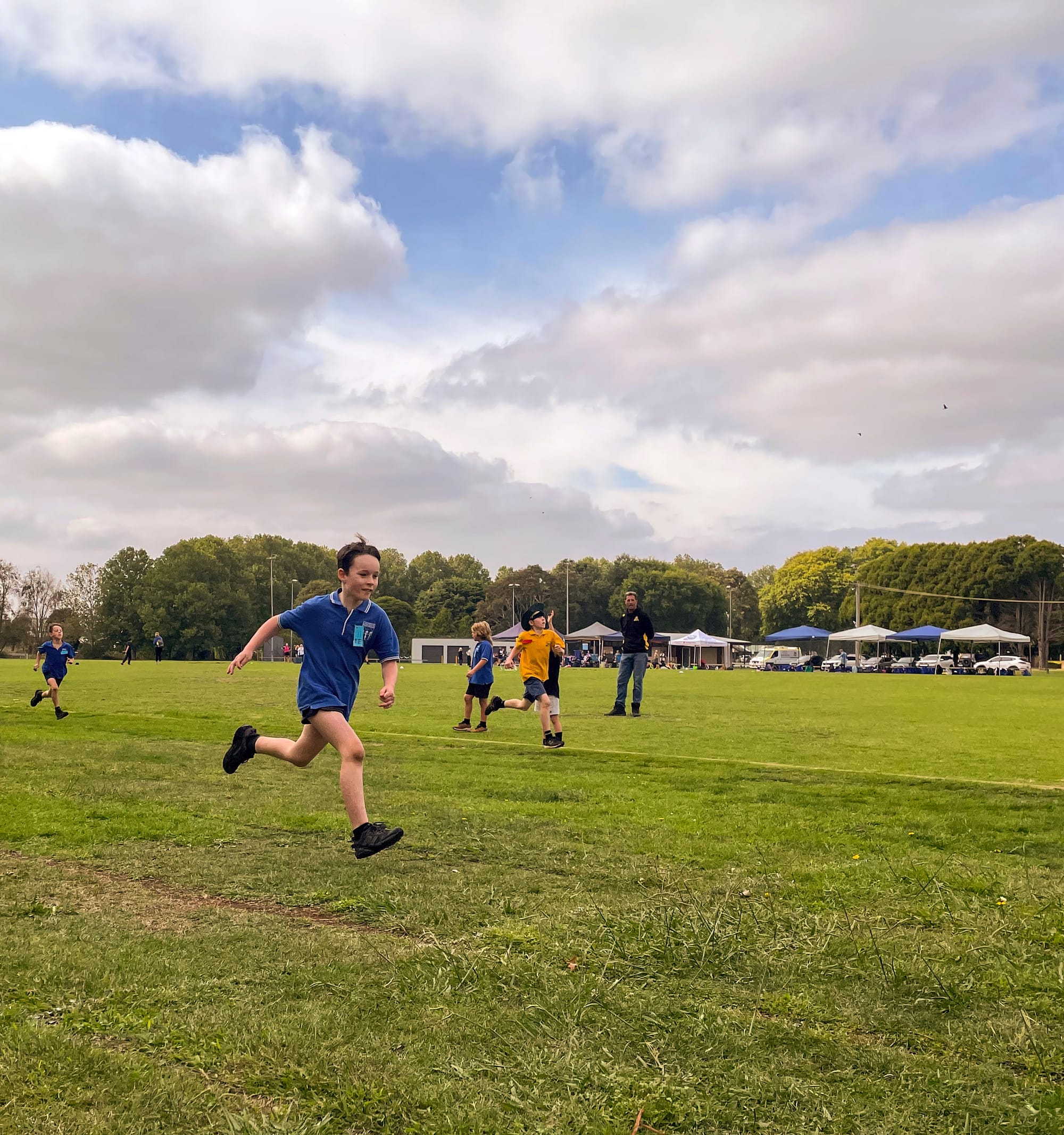 Labertouche Primary School grade three student Spencer races towards the finish line in the 200m sprint.