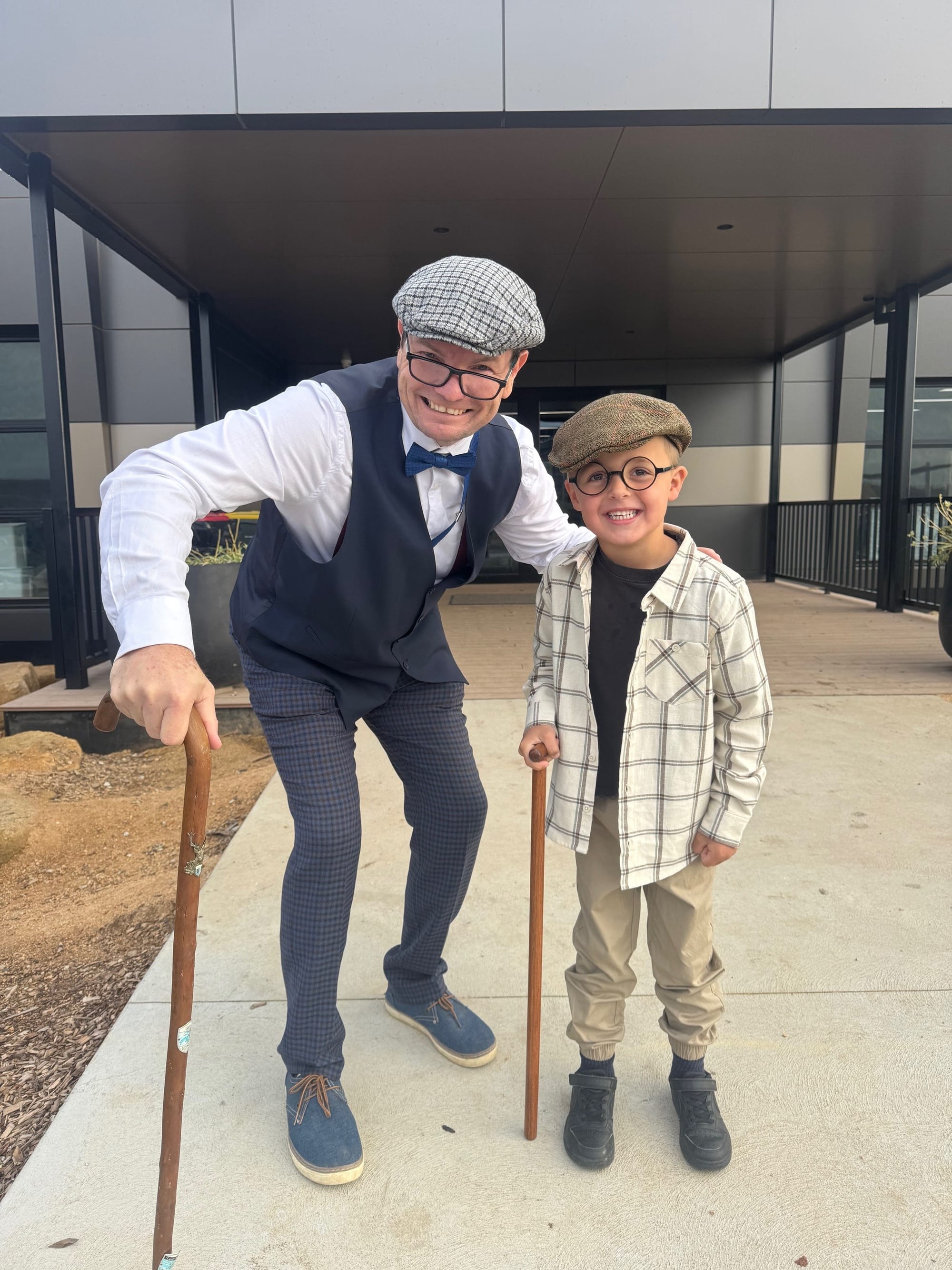Head of St Pauls Drouin junior school Mr Rowan van Raay with fellow centenarian Rusty Habgood.