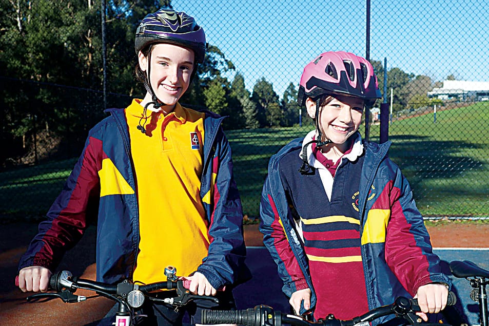 With their bikes at the ready are Eloise Gorton and Matilda Ruane.