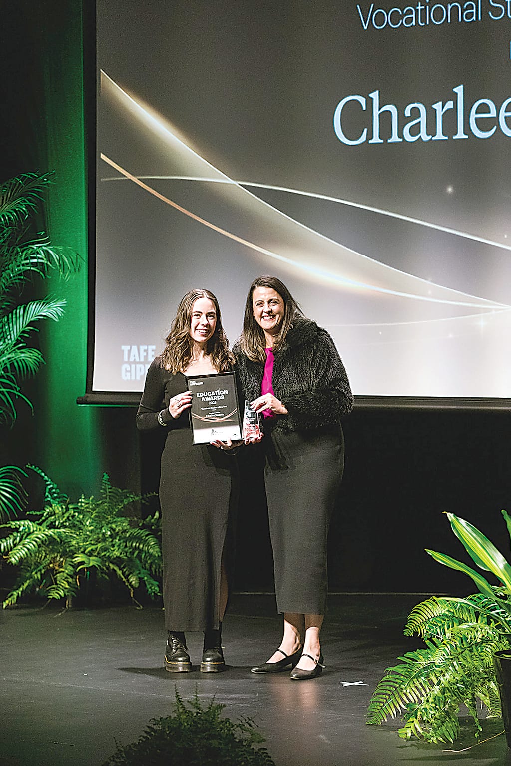Charlee Jinnette receives her vocational student of the year (health) award from TAFE Gippsland chief executive officer Laura Macpherson.