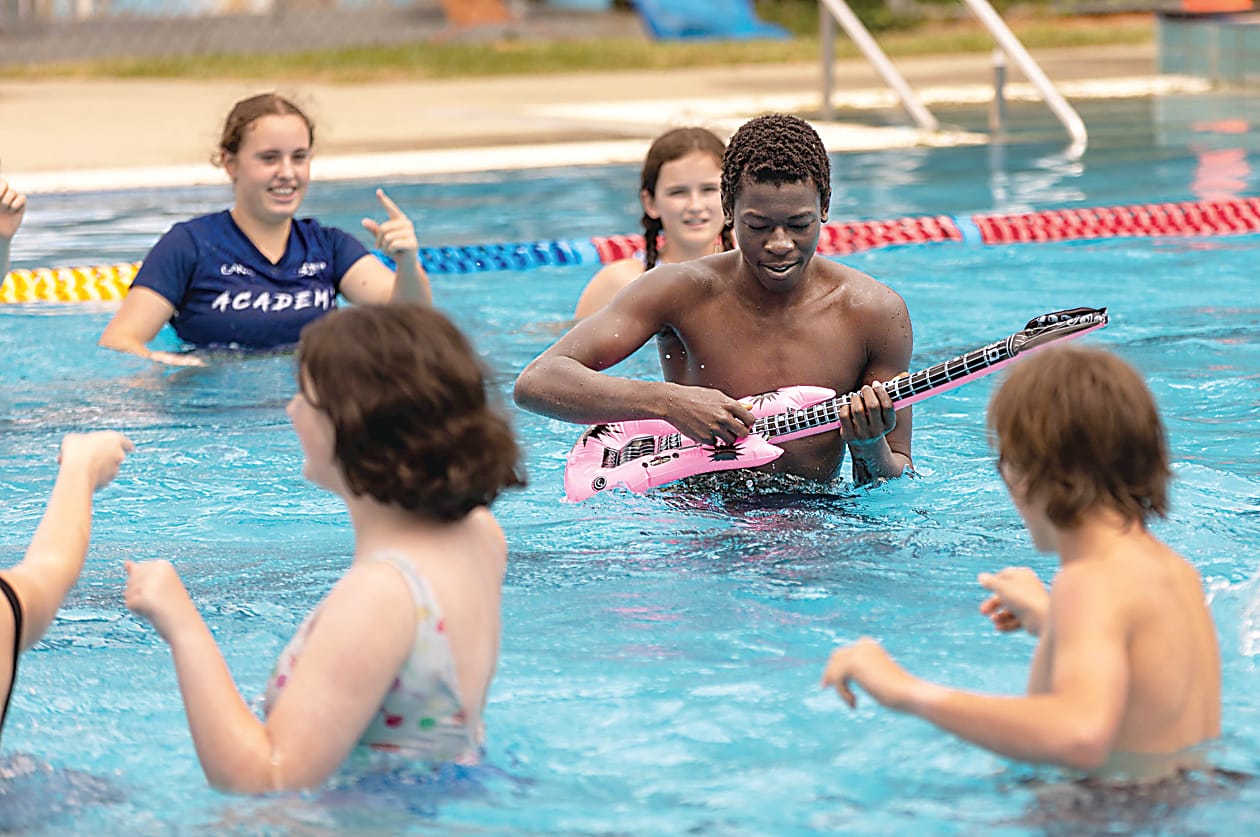 Chairo year nine students Emily Coster and Mia Lewis enjoyed the blow-up guitar skills of Stephen Oling (year 12) during Aylward's synchronised swimming routine.