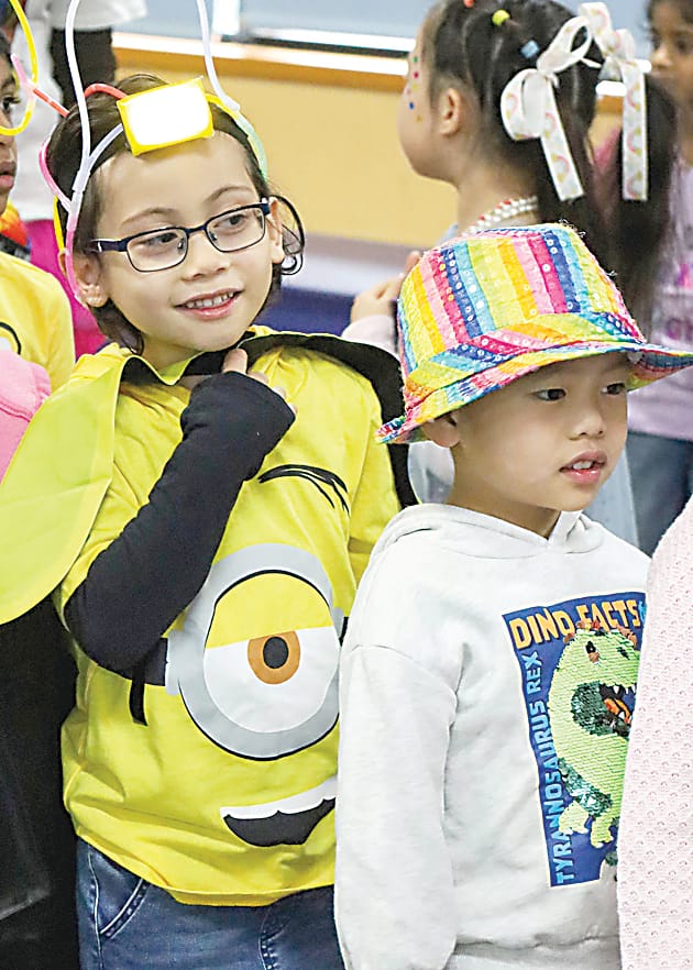 Parading around for their families are Christian Murray and Marden Mai.