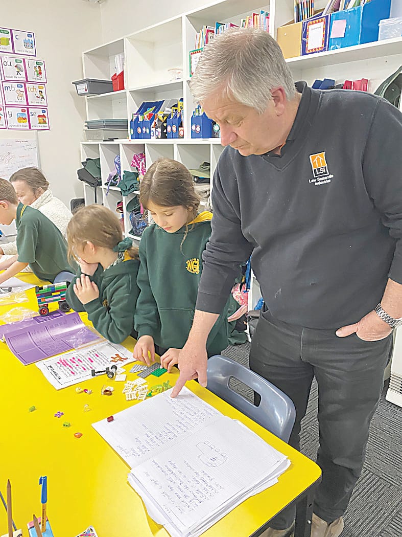 Above: Alexis and her grandfather Brad building her Lego car from the instructions she wrote.Above right: Three generations of the Marino family - students Reed and Acacia with dad Alex and grandparents Marilyn and Ron.Left: Nellie and her grandmother Glenda building her Lego car.Right: Hayley with her grandmother Kayleen.