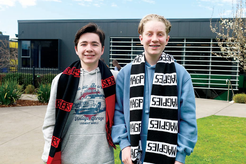 Cooper Snell and Archie Hammond show their support for AFL rivals Essendon and Collingwood.
