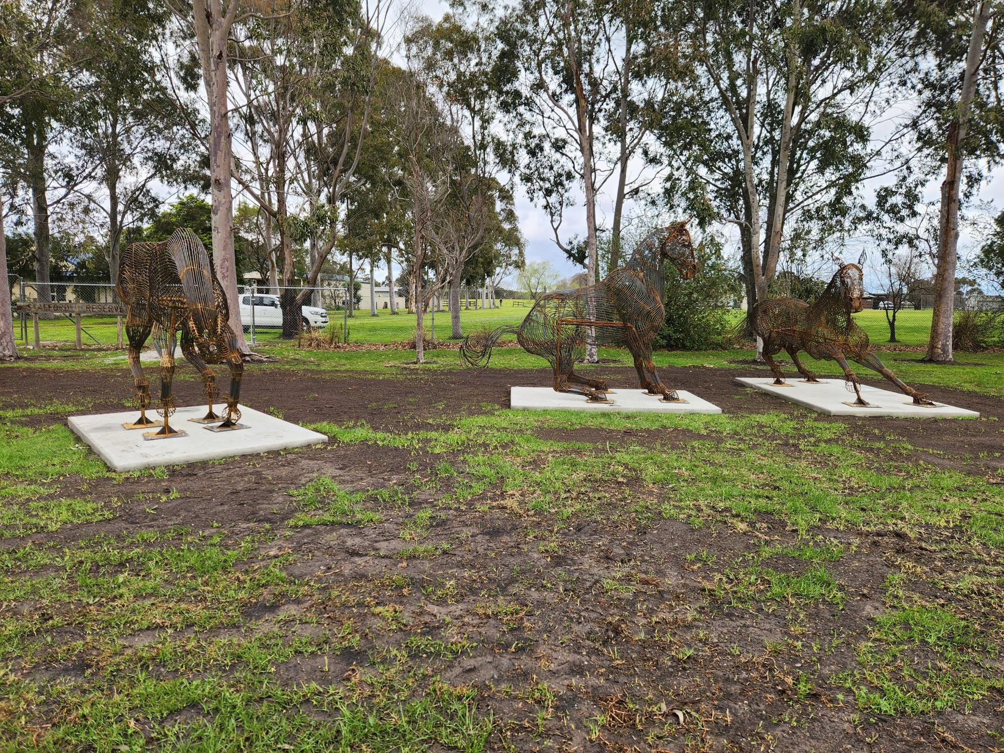In front of the rodeo artwork unveiled in Lang Lang are (from left) deputy mayor Cr Alanna Pomeroy, Lang Lang Pastoral, Agricultural and Horticultural Association president Leigh Kirby, sculpture artist Adam Humphreys and Westernport Ward Cr Trudi Paton.