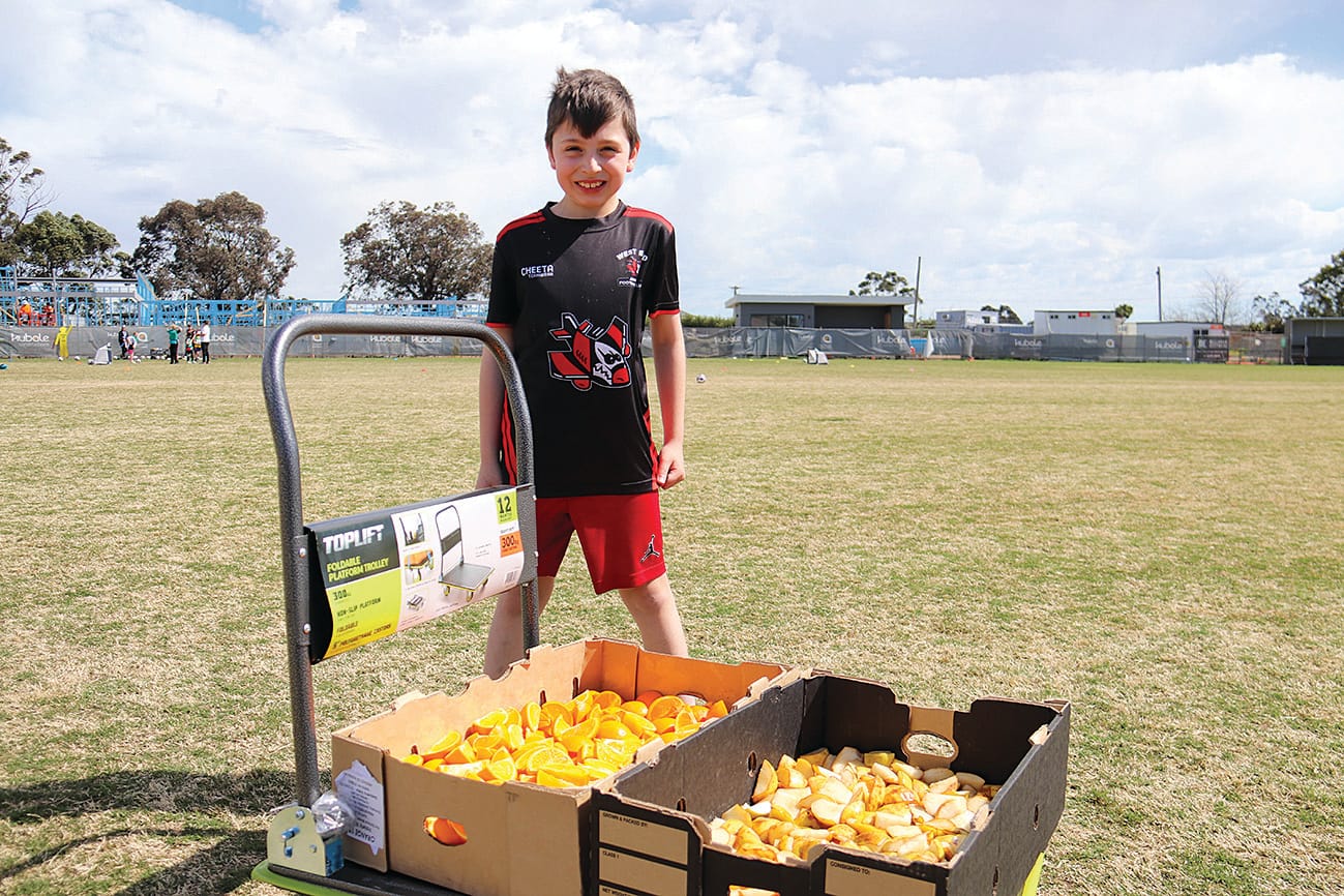 Nate Desira was in charge of providing the fruit slices during Yarragon's Sports Gala Day.