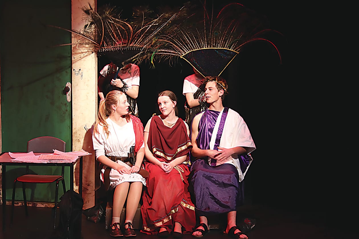 Right: Edie May Trent as Antony, Anneke Beamish as Cleopatra and Oscar Callanan as Caesar in an ancient Rome scene.