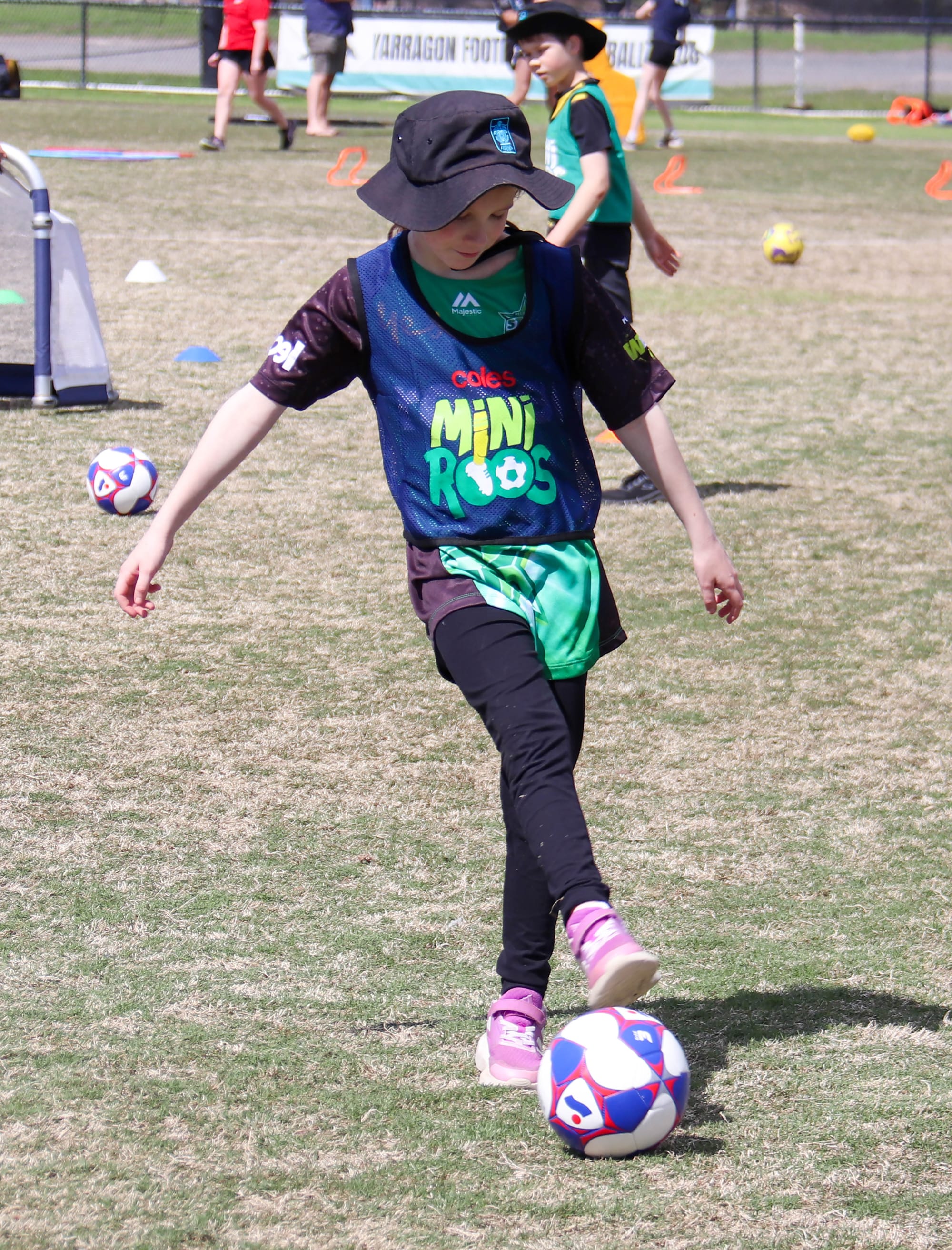 Passing to a nearby schoolmate is Peyton Davey.