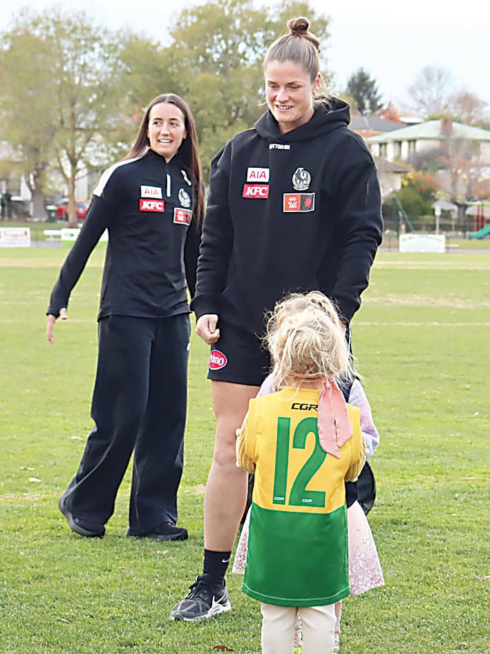 Collingwood captain Bri Davey oversees the smaller kids at the afternoon clinic at Western Park along with Airlie Runnalls (behind).