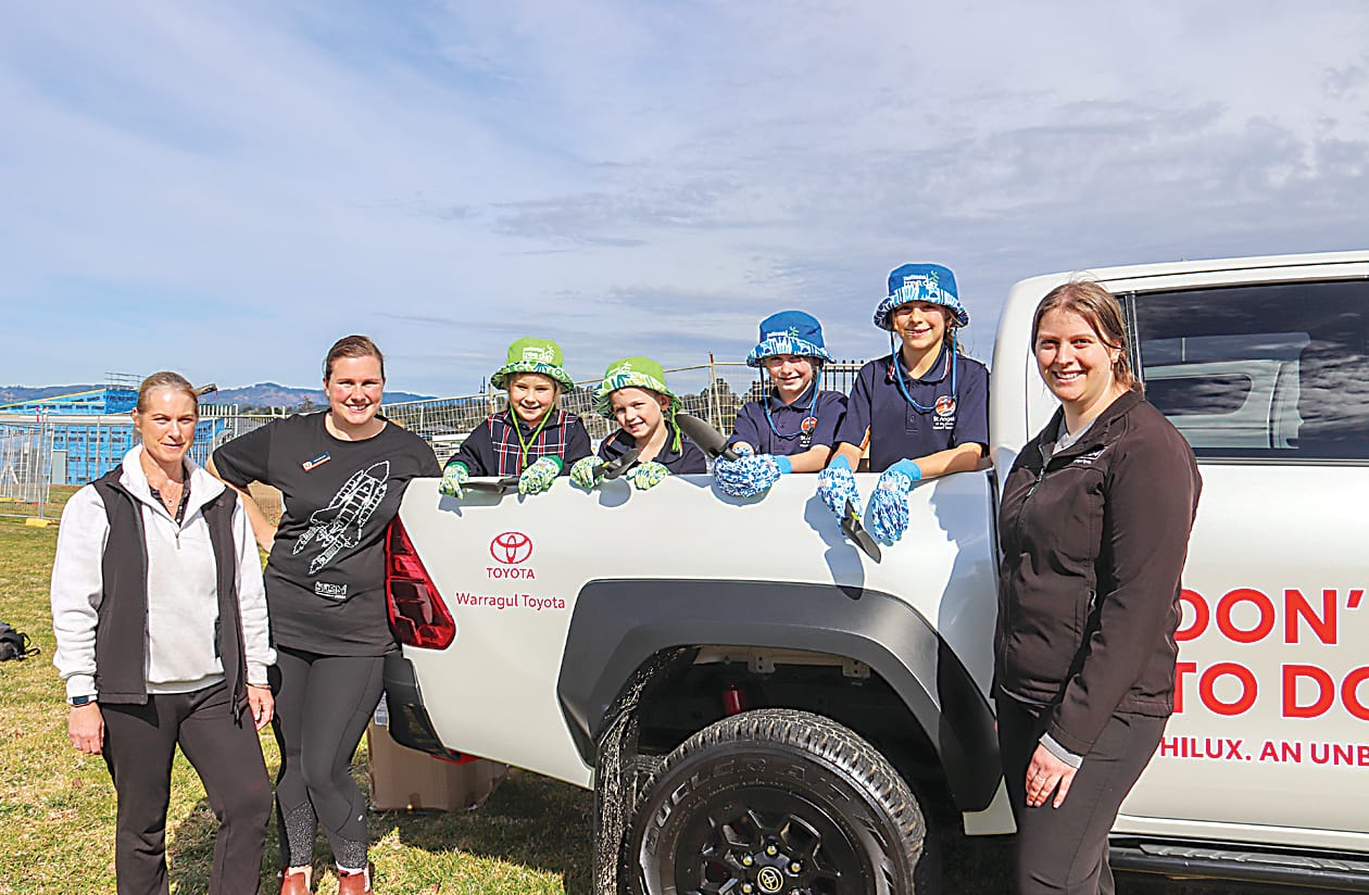 Above:  Students Archie and Max with Sharen Coulter from Habitat CreationsRight: Sarah Moore from Warragul Toyota, STEM teacher Mickey Davies, foundation students Eden and Ezra Kubale and their planting buddies Asher and Maddy and Samantha Forester.