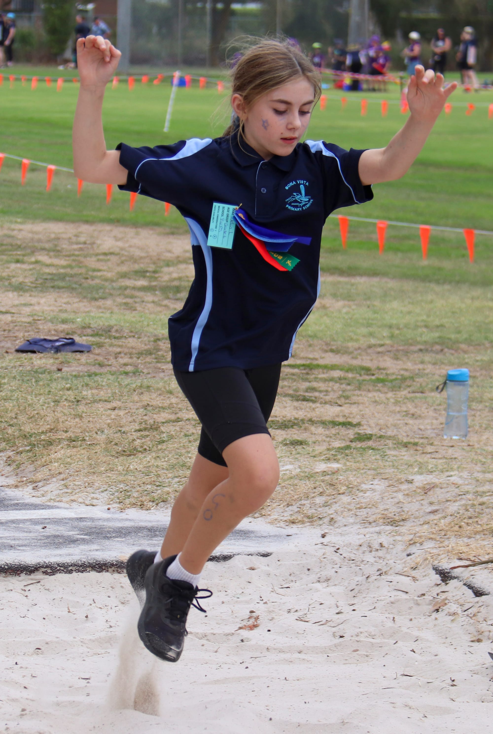 Bona Vista's Delia Lott lands in the long jump.