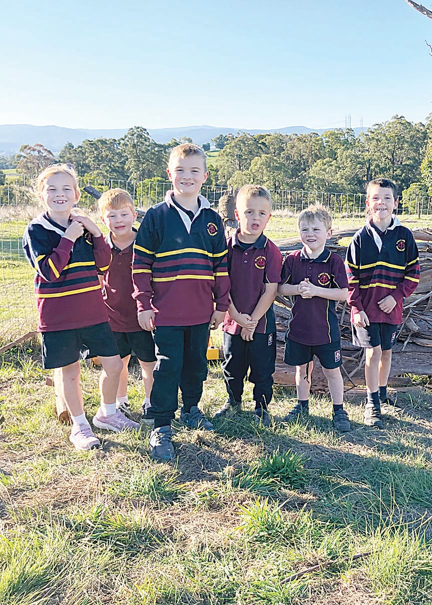 Billie Proctor, Thomas Proctor, Clancy Hatch, Rusty Habgood, William Elliott and Grayson Upston enjoy spending time outside on the project at the St Paul's Drouin campus.