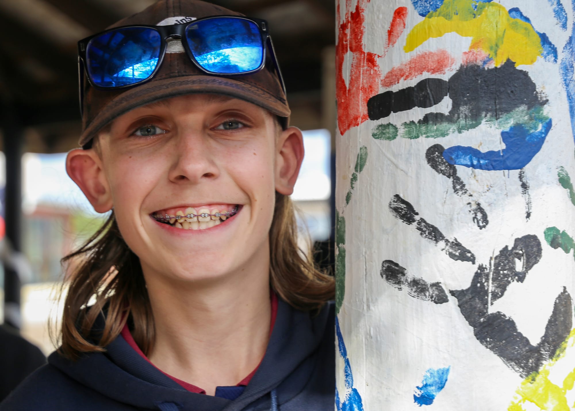 Tyler McIntosh with one of the hand painting displays.