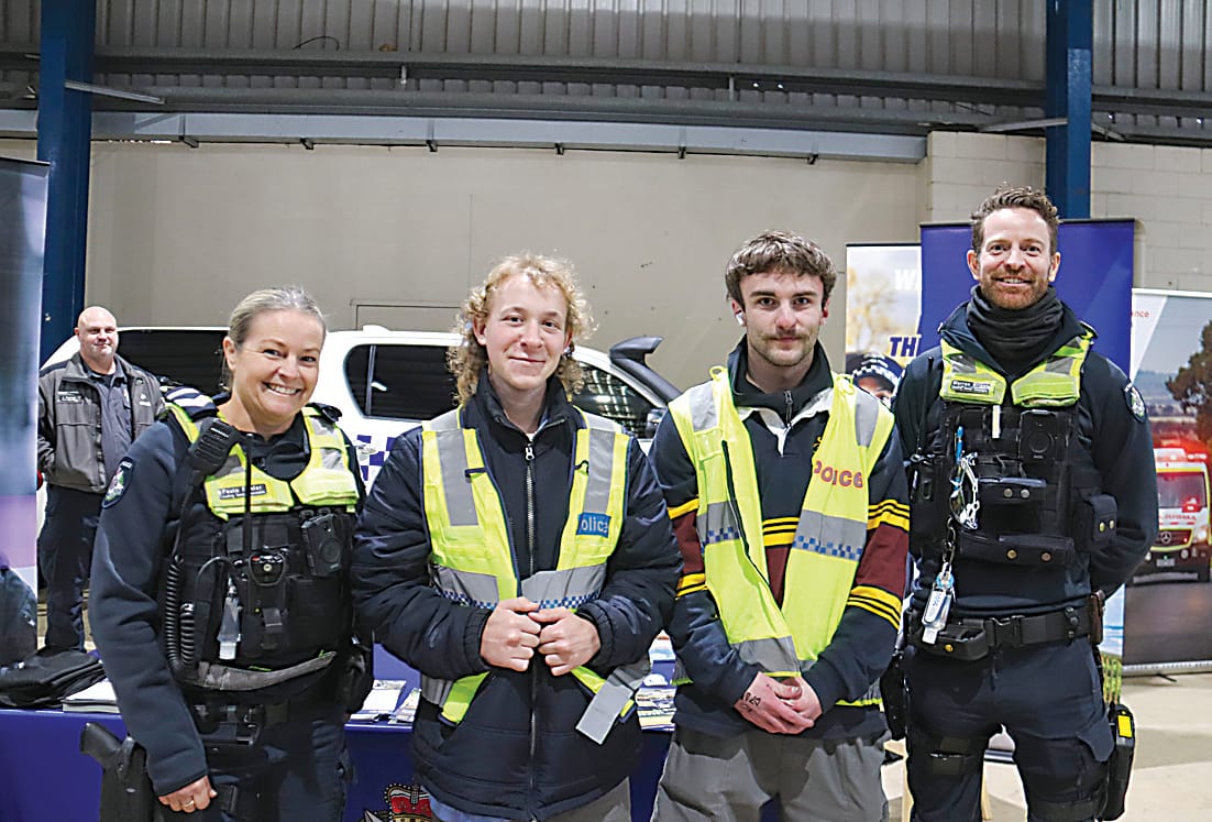 On the Victoria Police stand are from right to left, leading senior constable, Paula Fowler, Drouin Secondary College students Aaron Lawrence and Brodie Brindley and leading senior constable Warren Briggs