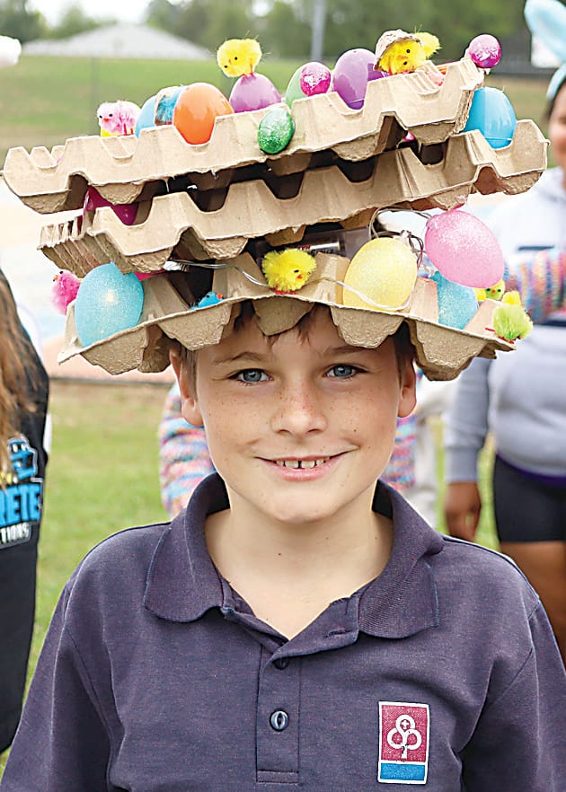 Eggs and chickens in colourful bonnets