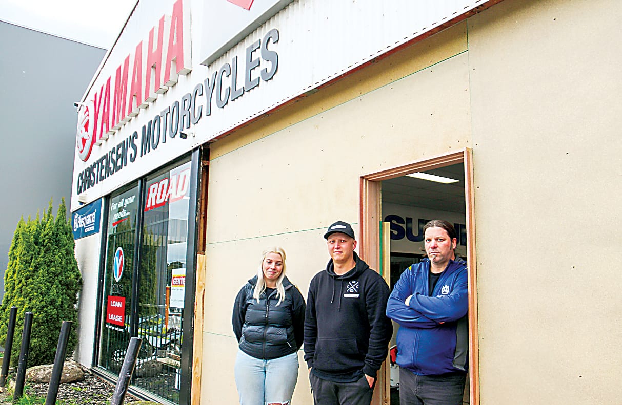 Christensen's Motorcycles part owner Trav Cooper (centre) and staff members Maddie Burns and Pete Wilhelms were left to clean up the aftermath of a smash and grab early on Wednesday morning.