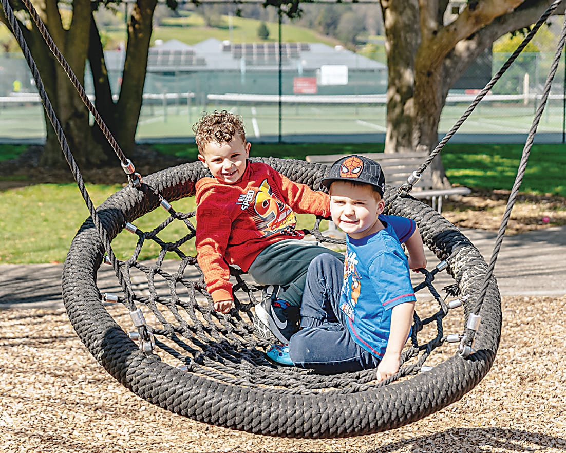 The swing was a hit for Thomas Giles and Brodie Robertson at the Trafalgar pop-up playgroup.