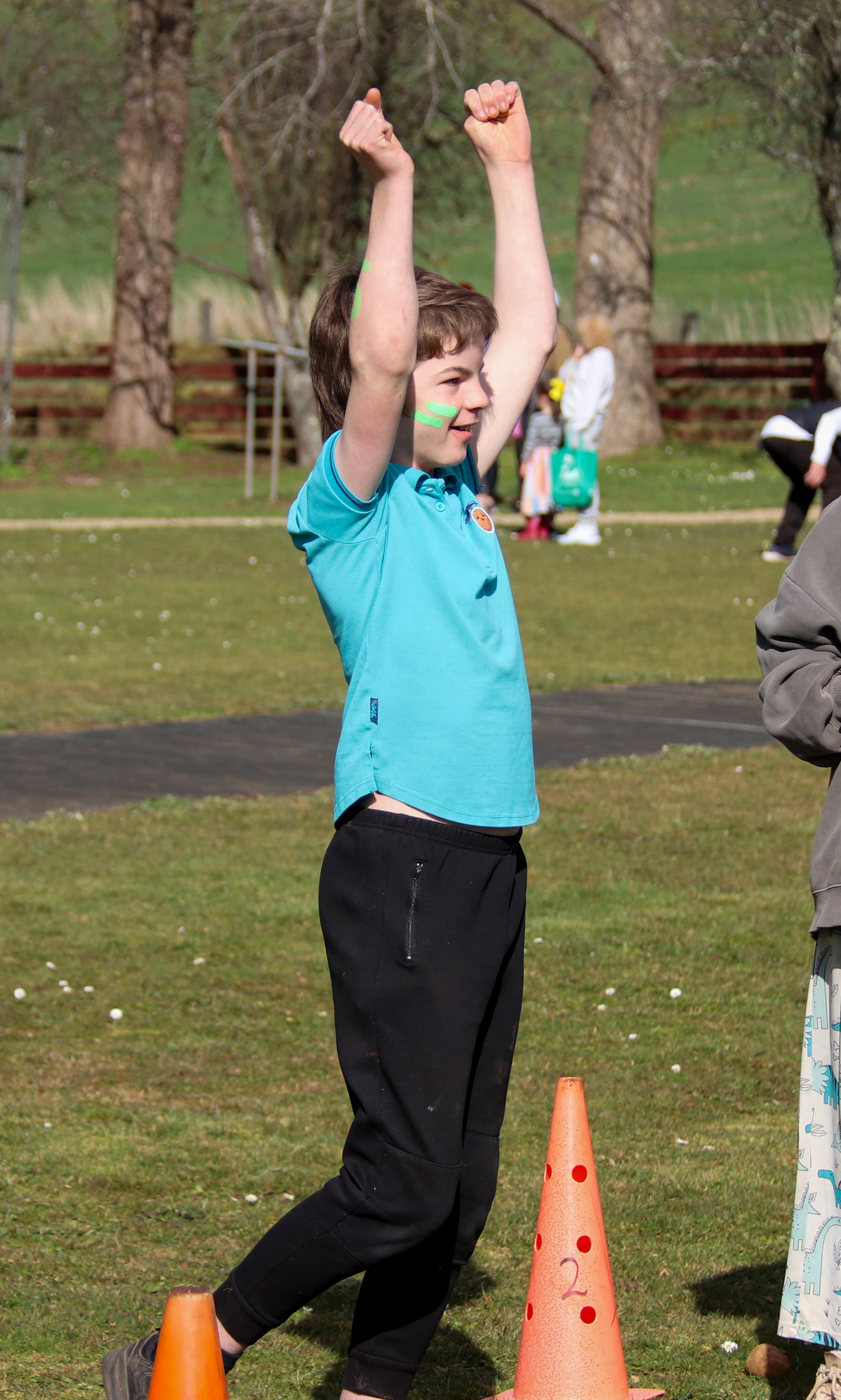 Samual Molesworth is delighted with his spud toss.