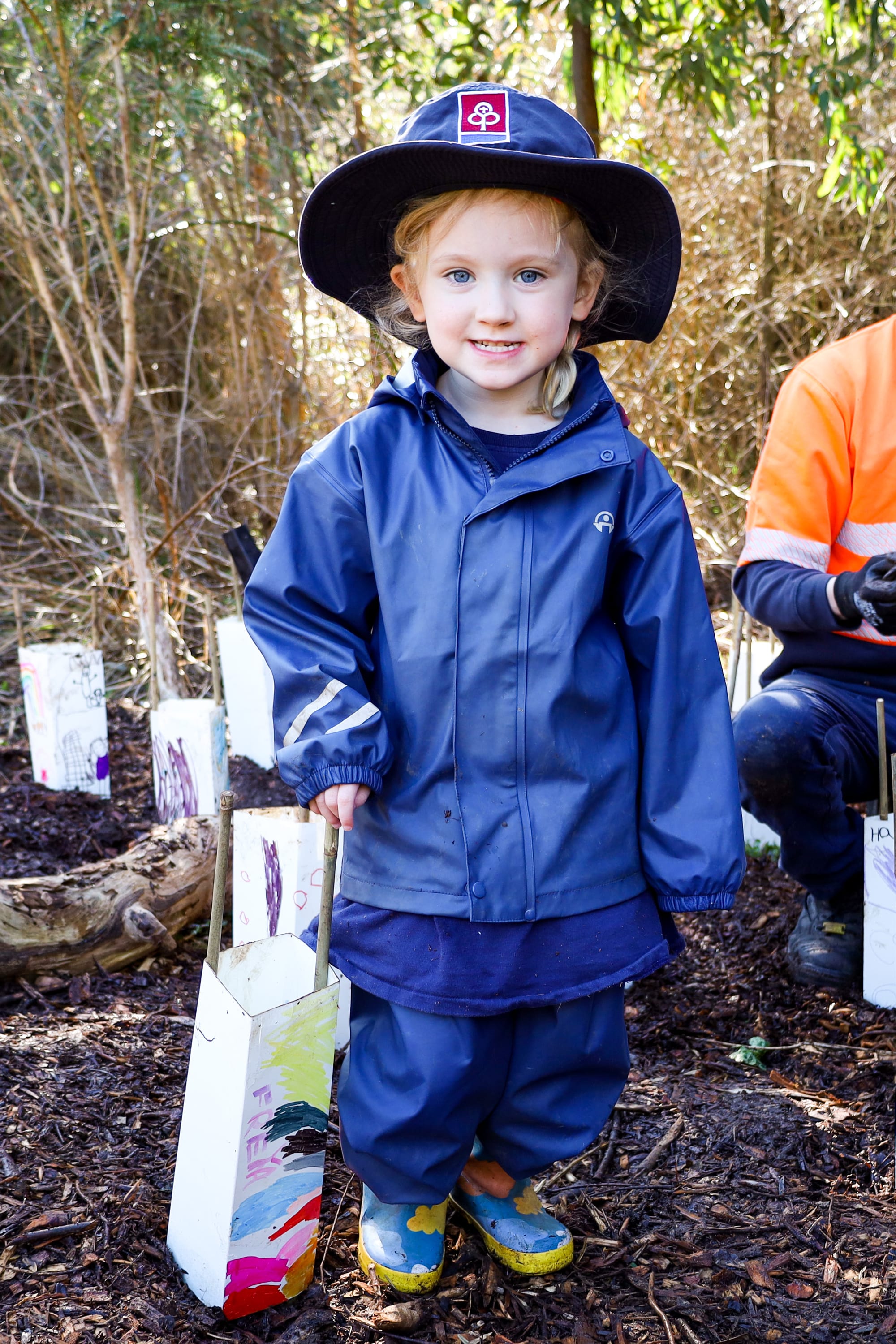 Freya used her colourfully painted tree guard to protect a seedling.