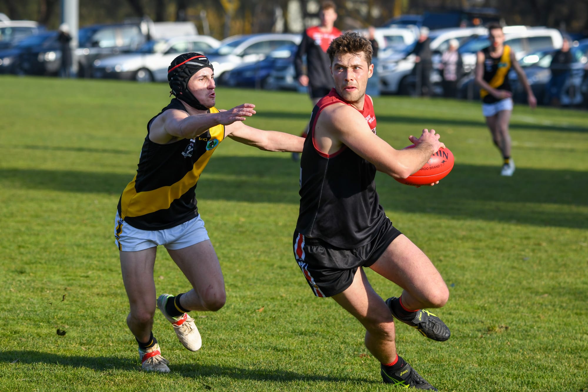 Footy seasons in limbo as COVID restrictions return
