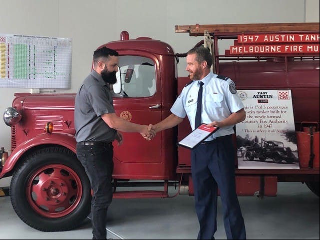 Captain Rob Fergusson (right) presented a certificate of appreciation to Fonterra Darnum, which was collected by site manager Leigh Grurley