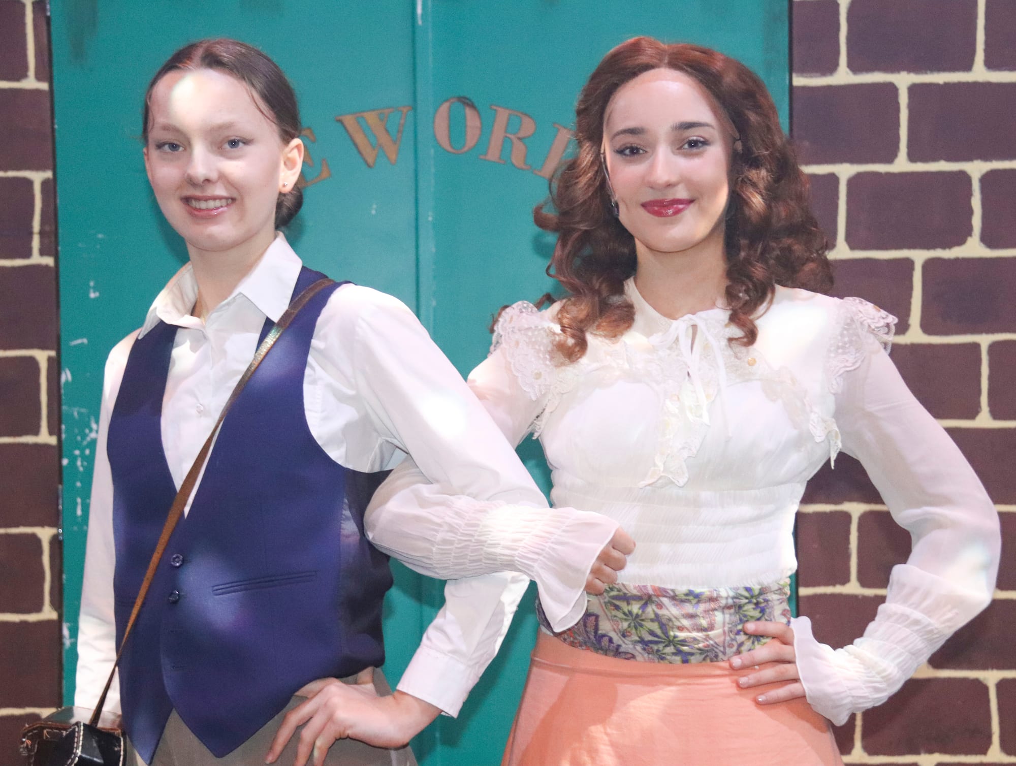 Played by Alana Magyar (right) budding young reporter Katherine Plumber works hand in hand with Darcy, her trusty photographer, played by Eva (left).