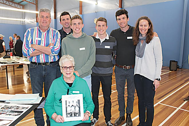 Three generations of the Bloye family. Back: Phil Bloye, Nick Bloye, Josh Bloye, Tim Bloye, Pat Bloye, Lyndel Kennedy (Bloye). Seated: Helen Bloye holding a photo of herself and her husband, Graeme, in the A grade premiership team in 1966. Harold Spargo (dec) also was in the team.