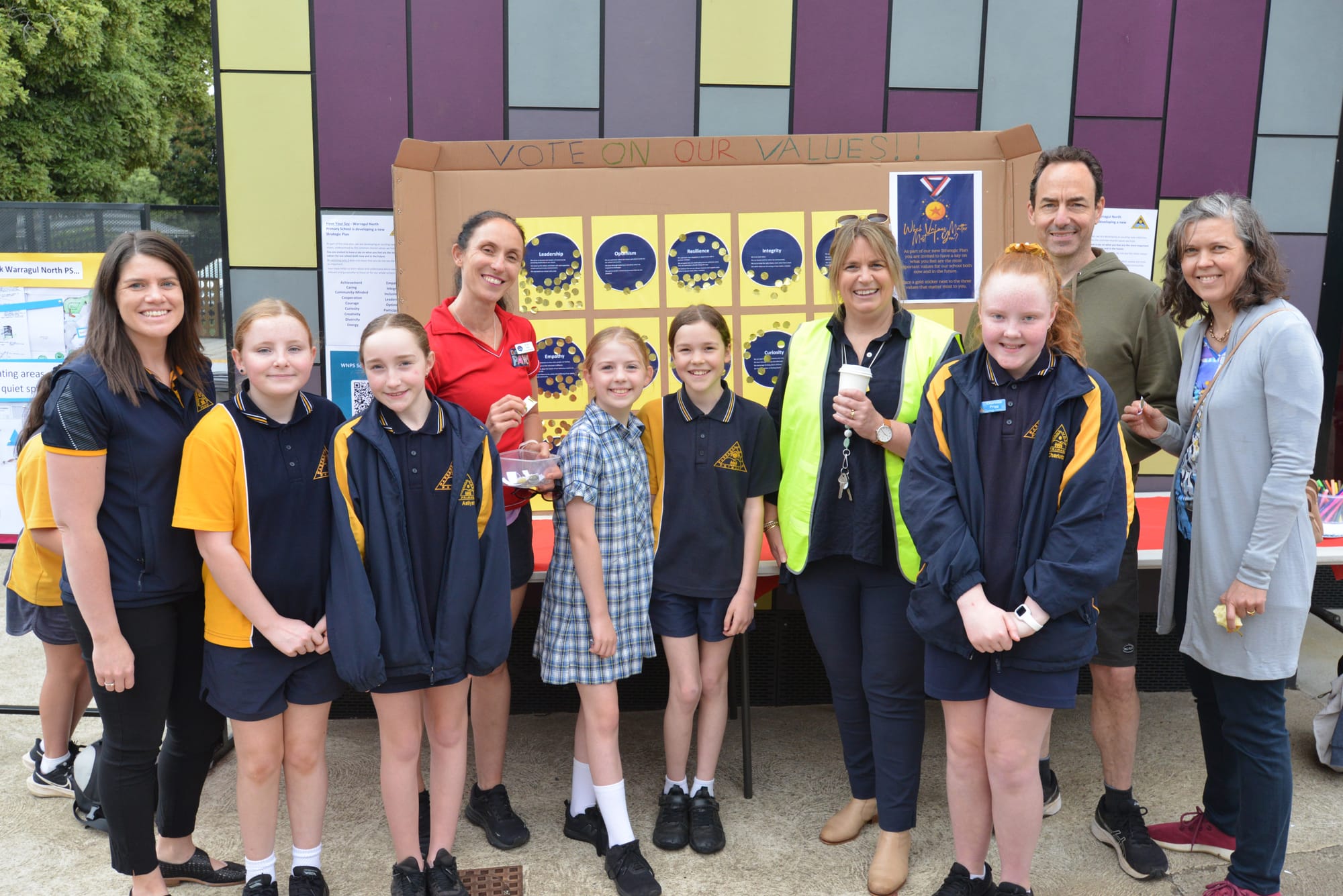 Voting on school values at Warragul North Primary School are (from left) learning specialist Toni Barker, Shayla Van Der Wolde, Aaliyah Ward-Booth, school council president Terri Wilks, Lacey O'Brien, Maggie Hallyburton, principal Jo Osler, Charlotte Prigg and parents Nick Bruse and Rinske Poulier.