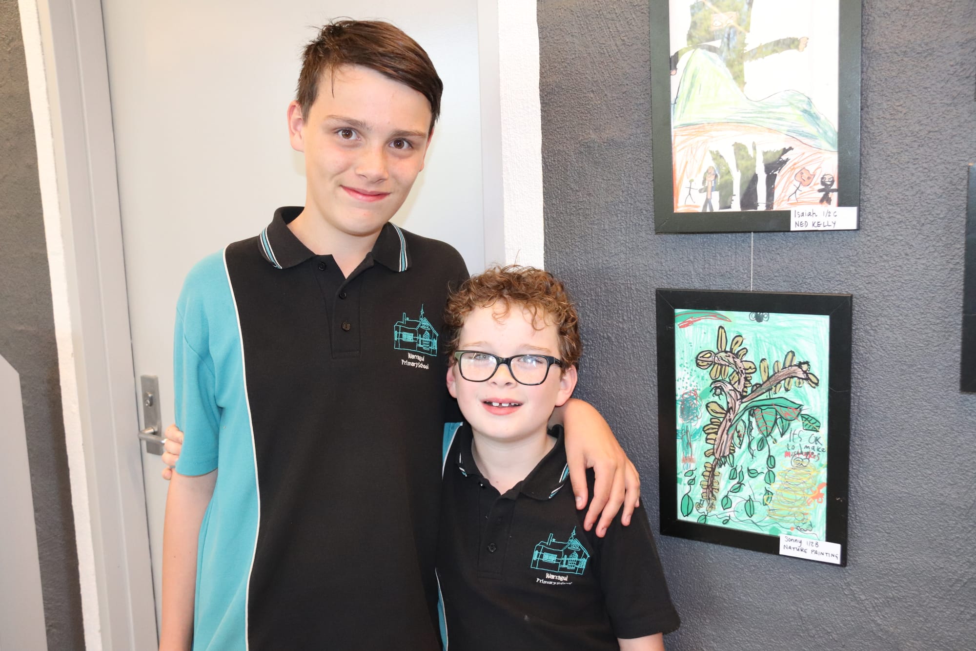 Finn Grumley (left) is suitably impressed by the art that Sonny Gillhoff showed him.