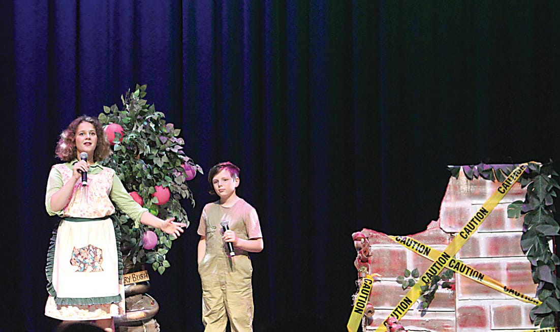 Right: Standing in front of some gorgeous sets, Annabelle Pyman and Alfie Bucknall sang their hearts out on stage.