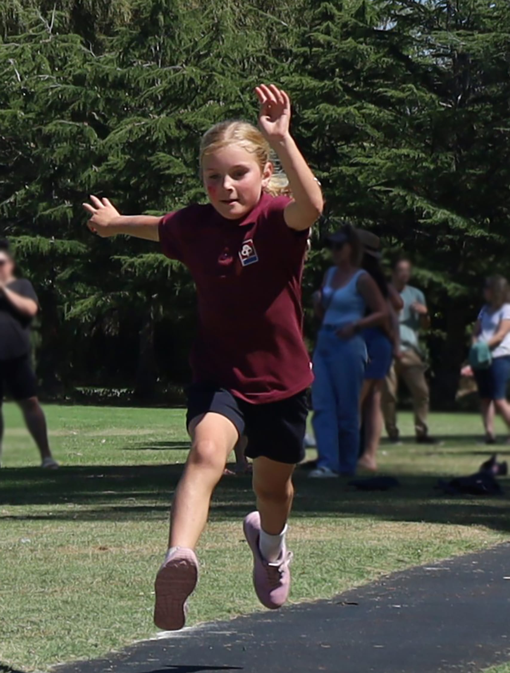 Year four student Charlie van Stokrom leaps high in the air.