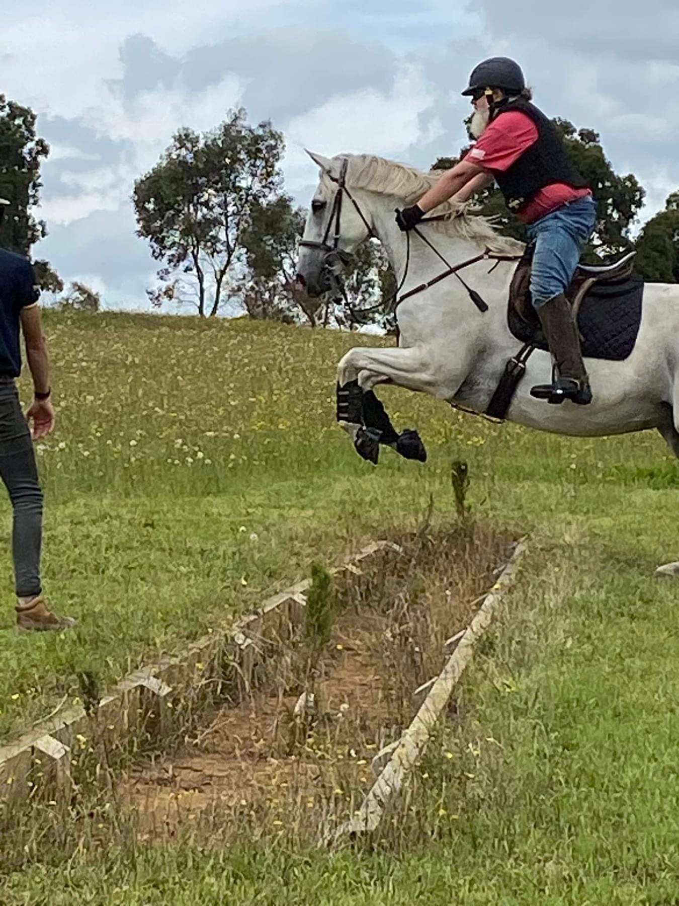 Rider Jo Harris and his horse tackle a jump at the rally conducted by the West Gippsland Adult Riding Club rally.