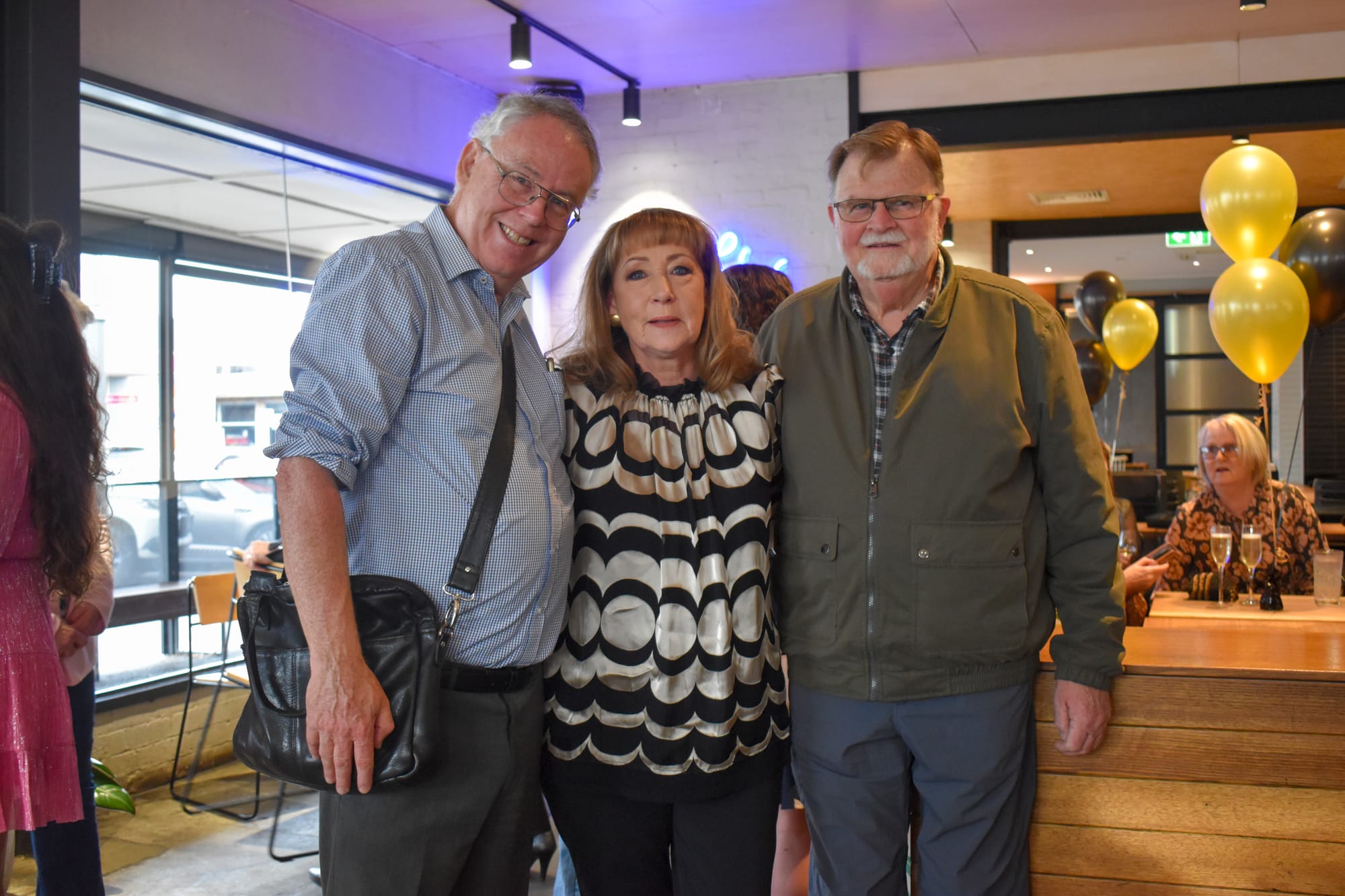 Corinne Collins (centre) with former Warragul Primary School colleagues Robert Barr and Dennis Horsburgh.