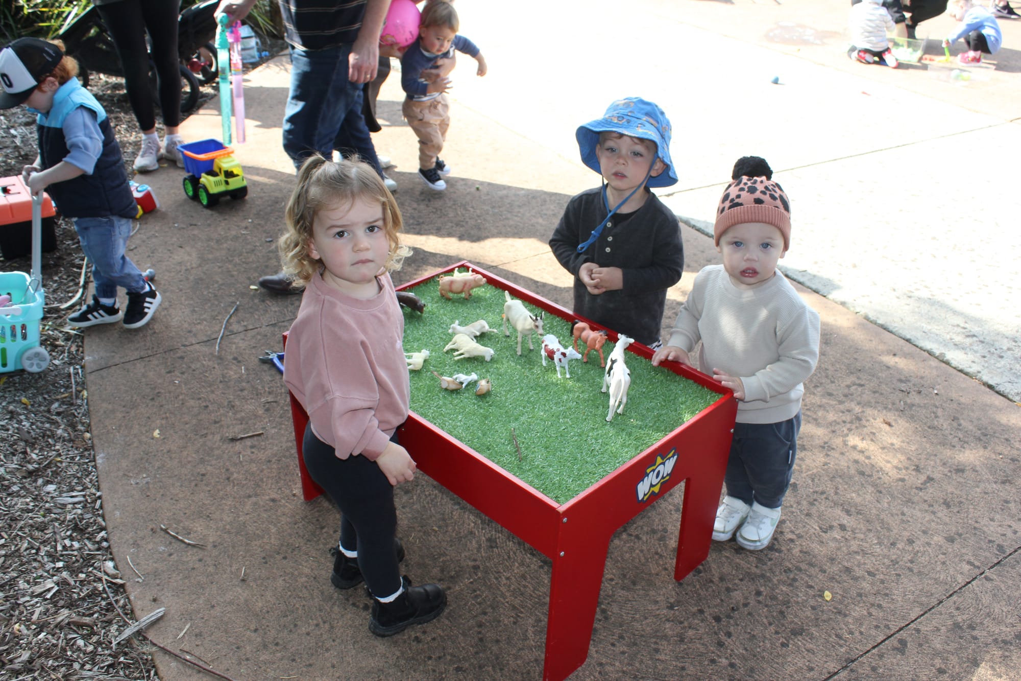 Banksi Davidson, Jimmy Zave and Morris Fazzino at the farm animal table