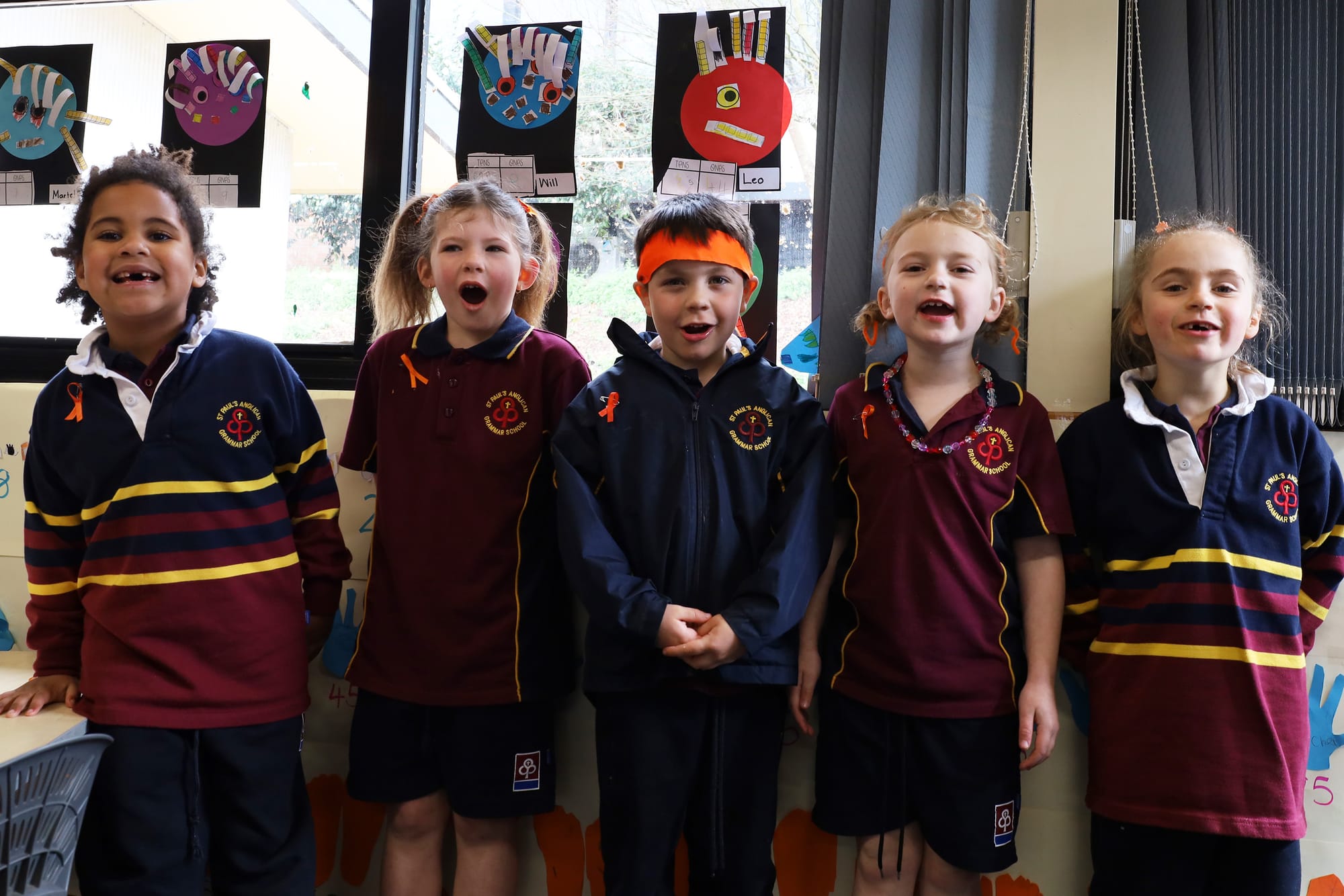 Prep students Aurora Stewart, Claire Summerscales, William Bloomer, Saskia Shean and Astoria Hornsey wearing a splash of orange in support of NDA.
