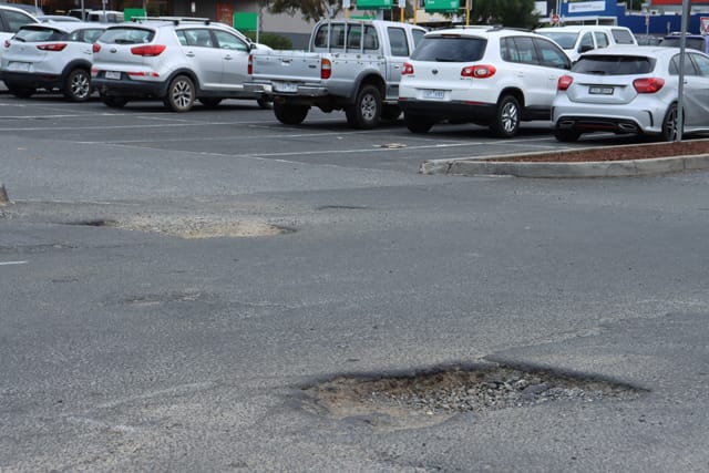 Pot Holes Woolies Carpark - 10.02.2022