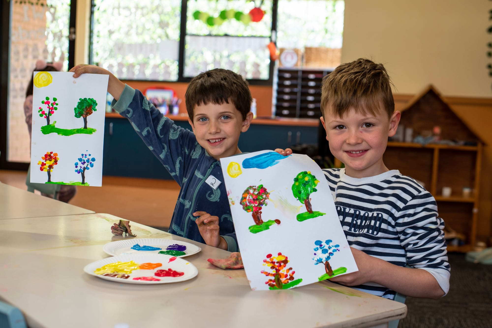 Harry Cartlidge and Lachlan Eriksson present their artwork based on the book All Through the Year by Jane Godwin.