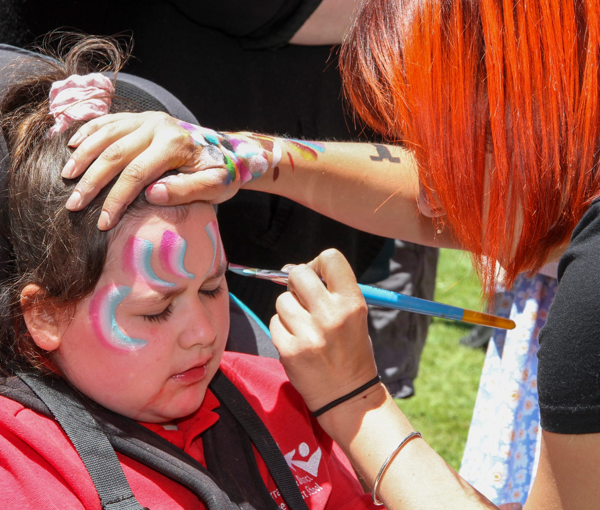 Student Stevie with Amanda Henderson from Fizzy Face children's entertainment.