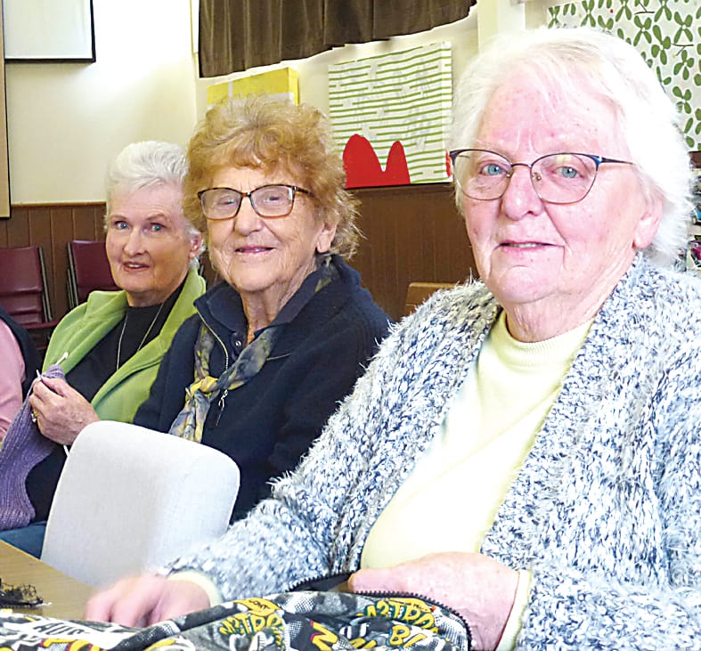 Beryl Campbell, Nellie Marsh and Margaret Dobson all from Garfield hard at work.