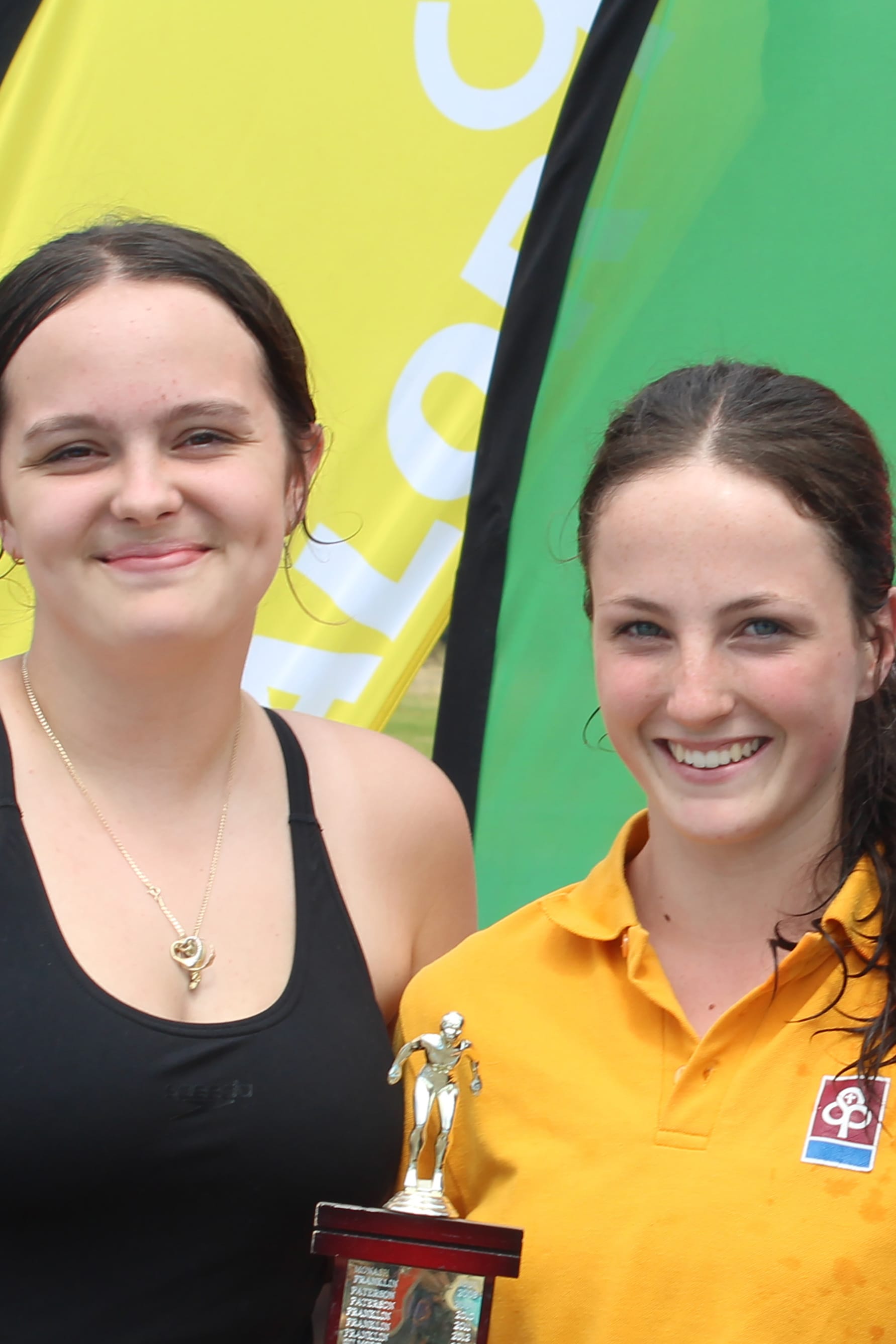 Lalor House captains Isobella Sellers and Livi Shone with the senior swimming trophy.