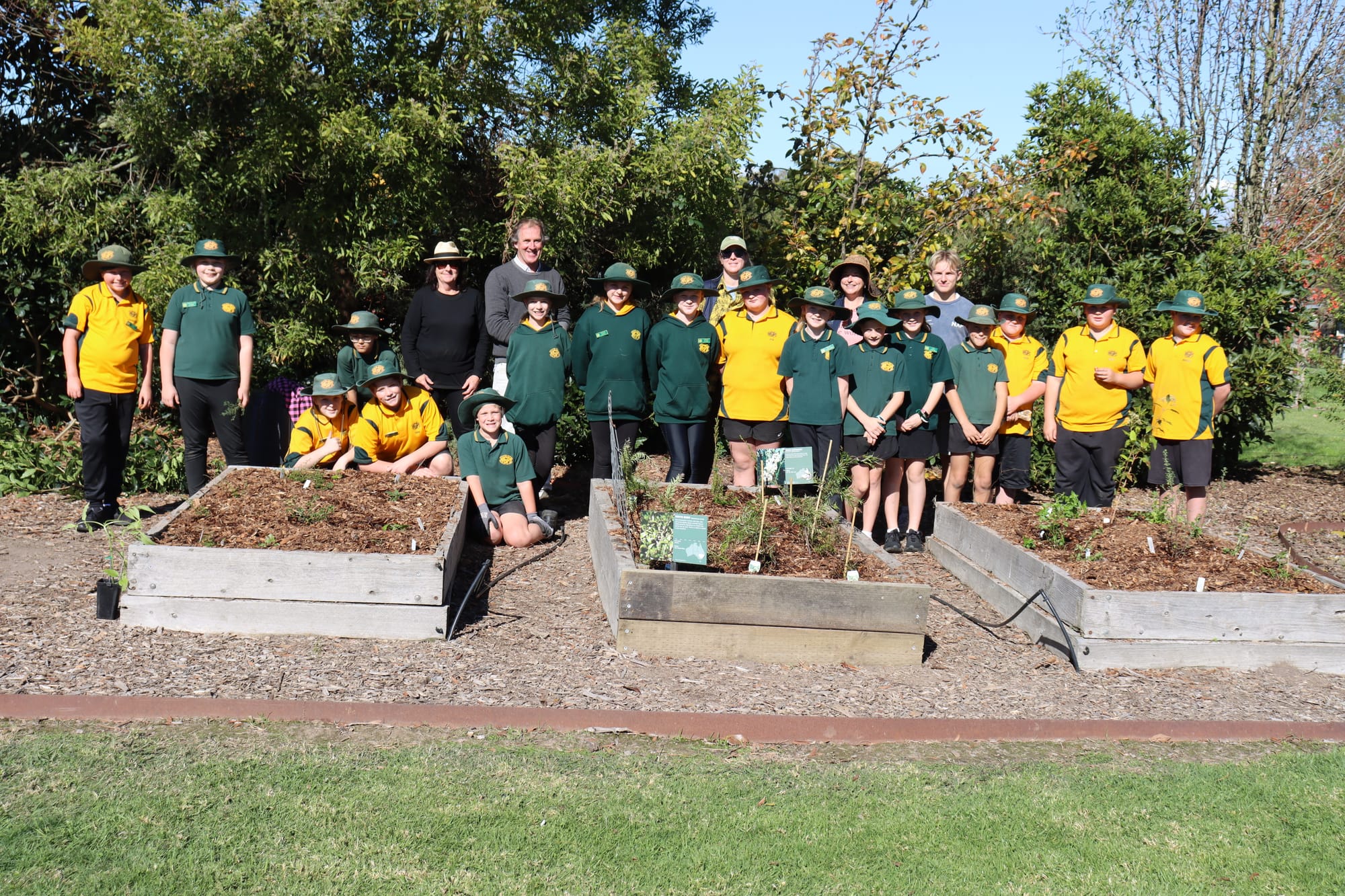 Back row (l-r) Julie  Weatherhead and Anthony Hooper from Peppermint Ridge farm with Laura Bowles and Caroline Hammond from Latrobe Catchment Landcare Network with work experience student DylanFront row (l-r) Jackson, Charlye-Rae, James, Addison, Matilda, Charlie, Ava, Ebony, Loui, Ava, Ollie, Jack, Dane, Brodie, Angus, Jake and Lucas