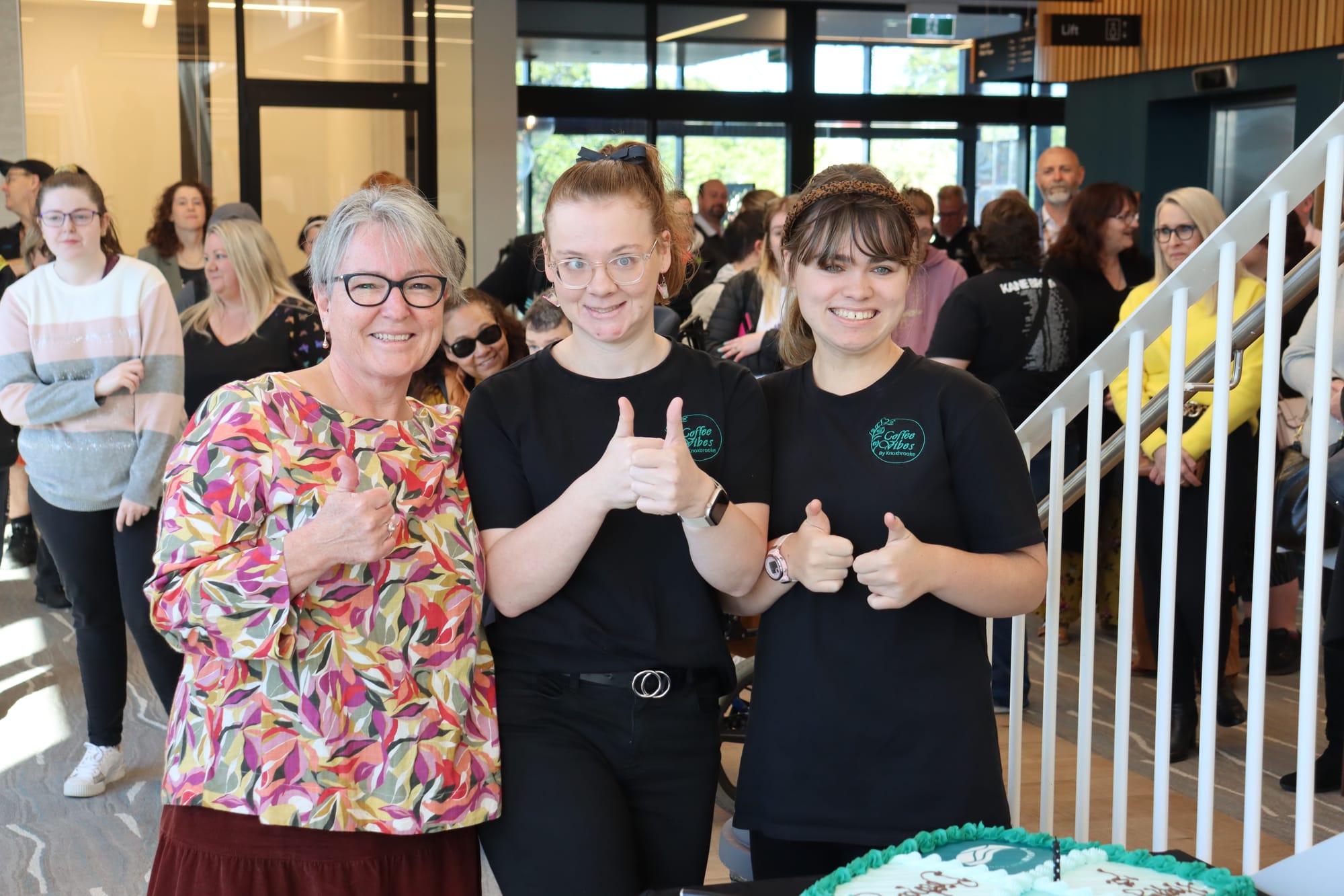 Baw Baw Shire Council Mayor Cr Annemarie McCabe celebrates Coffee Vibes' first birthday with cafe staff members Isabella McDougall and Paige Helmuth