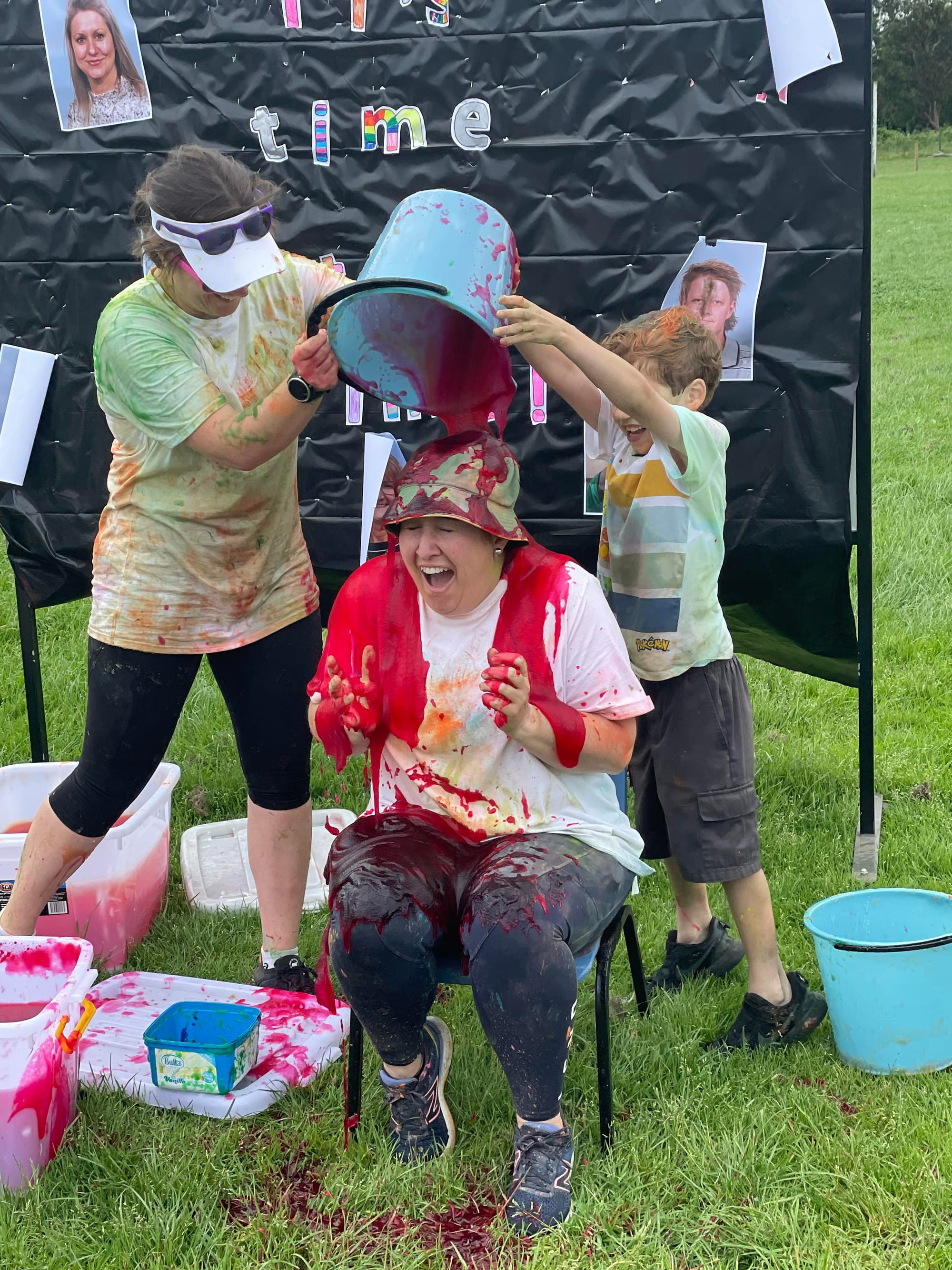Teacher Taryn Maxwell-Garratt cringes as she is slimed by her students.